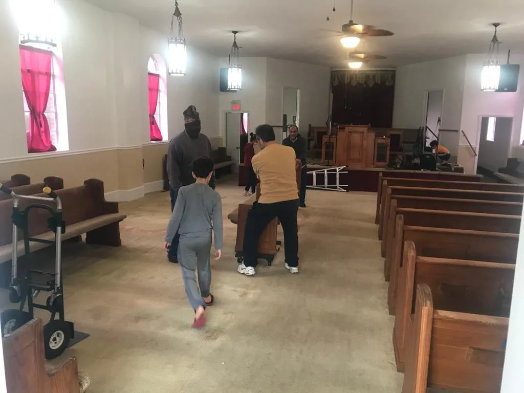Volunteers working inside the building